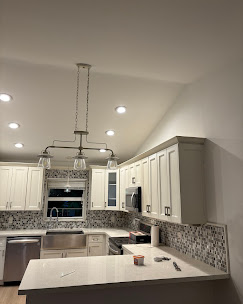 Completed smooth ceiling in Jupiter FL kitchen with recessed lighting